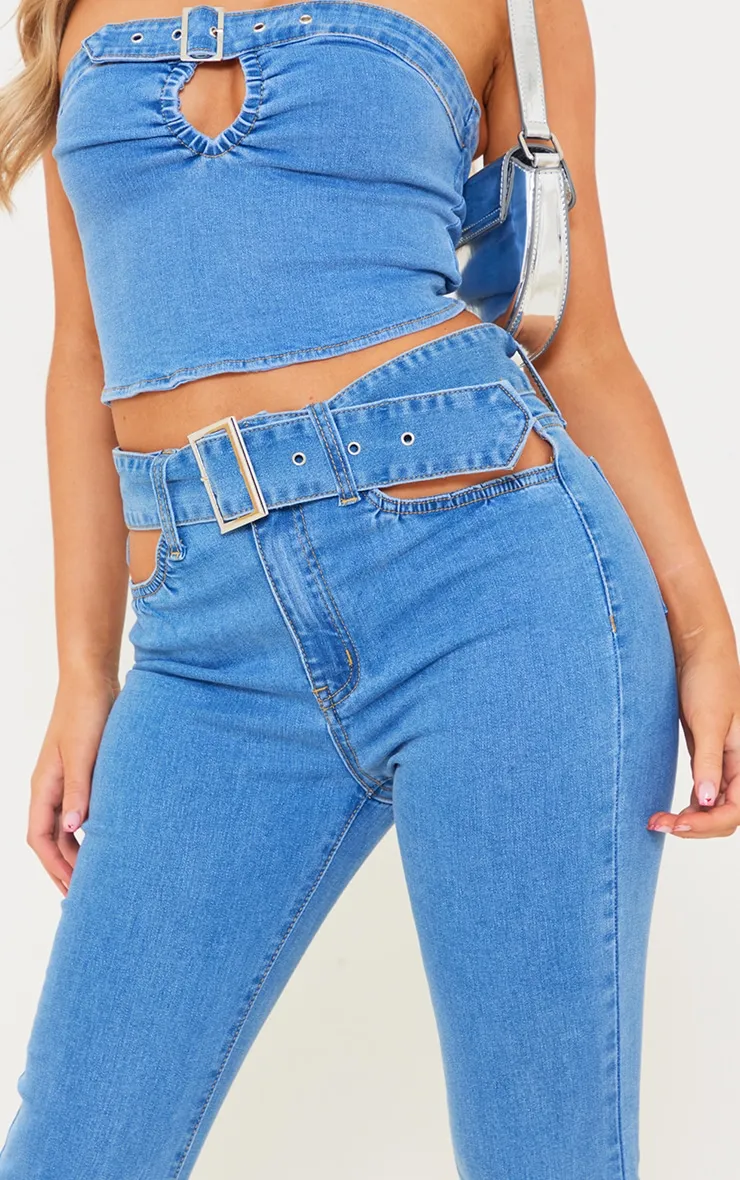 Jean flare bleu délavé à ceinture